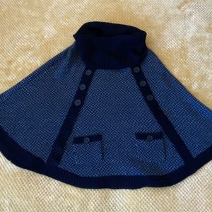 Women’s turtleneck poncho.